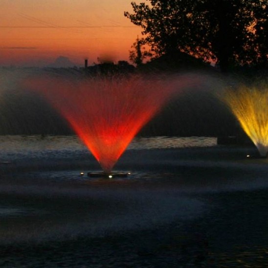 Fountains in a lake at night