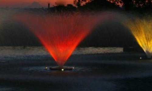 img (3) Fountains in a lake at night