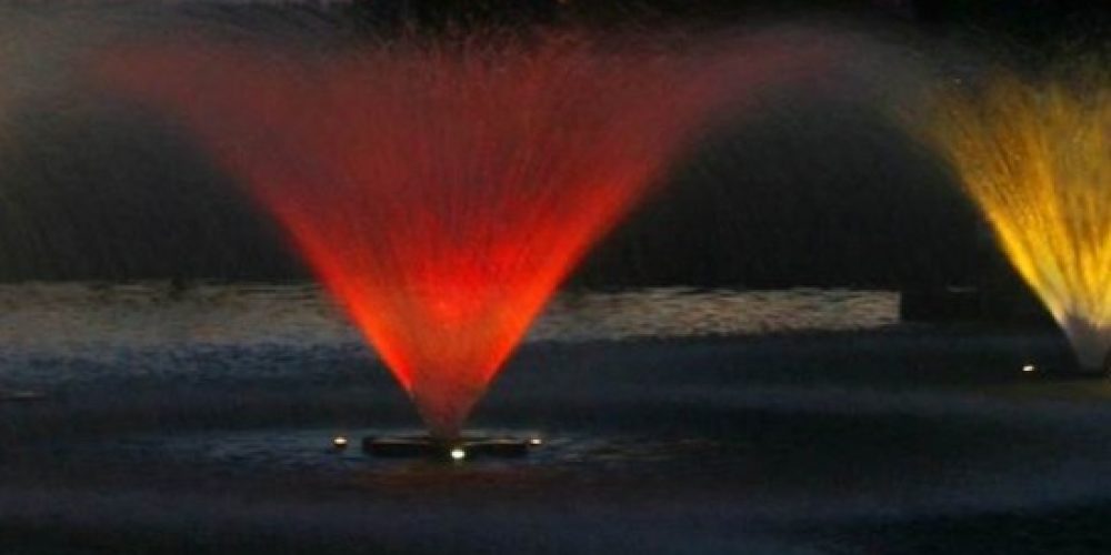 img (3) Fountains in a lake at night